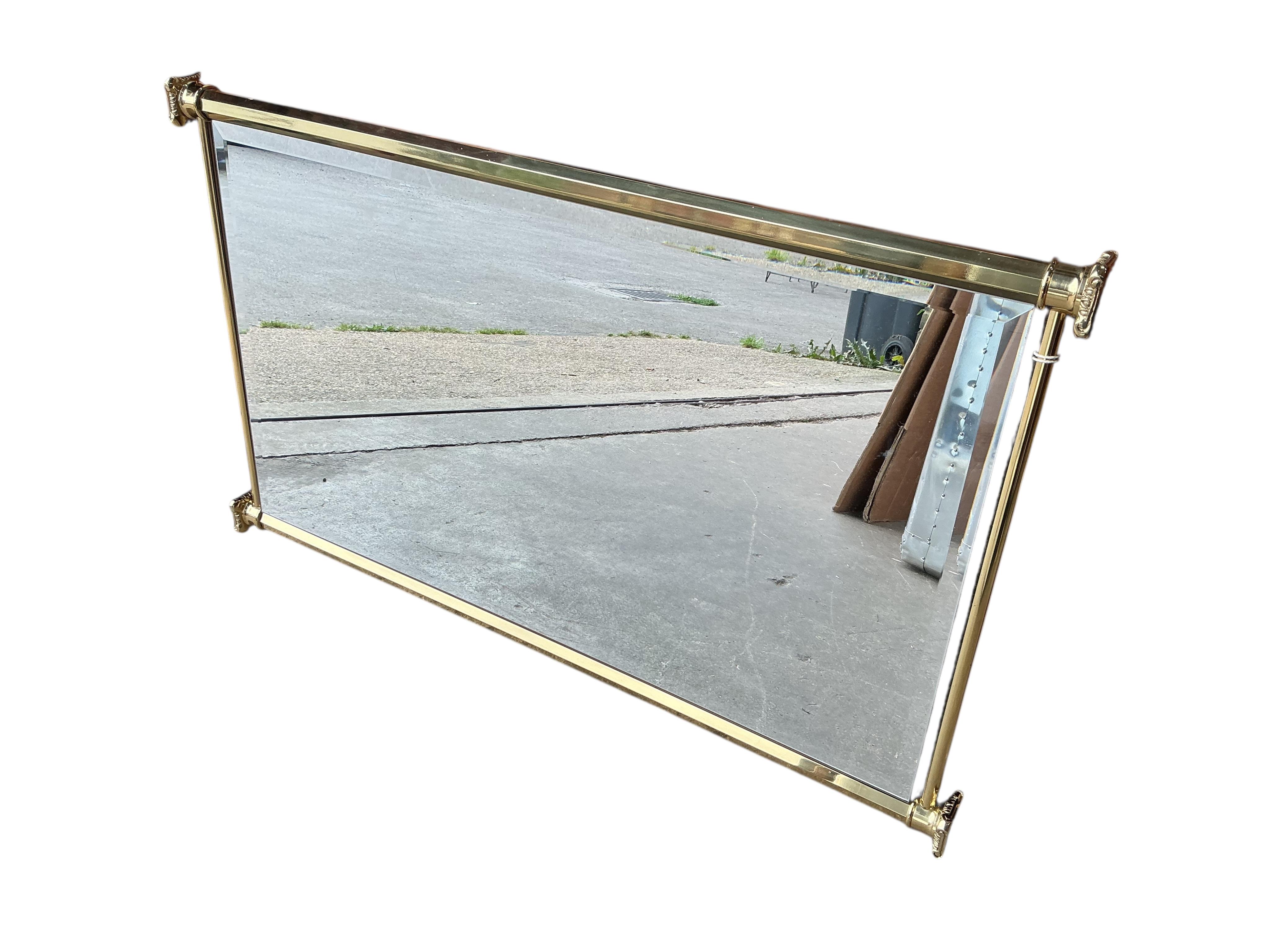 A modern brass framed rectangular wall mirror, width 100cm, height 60cm